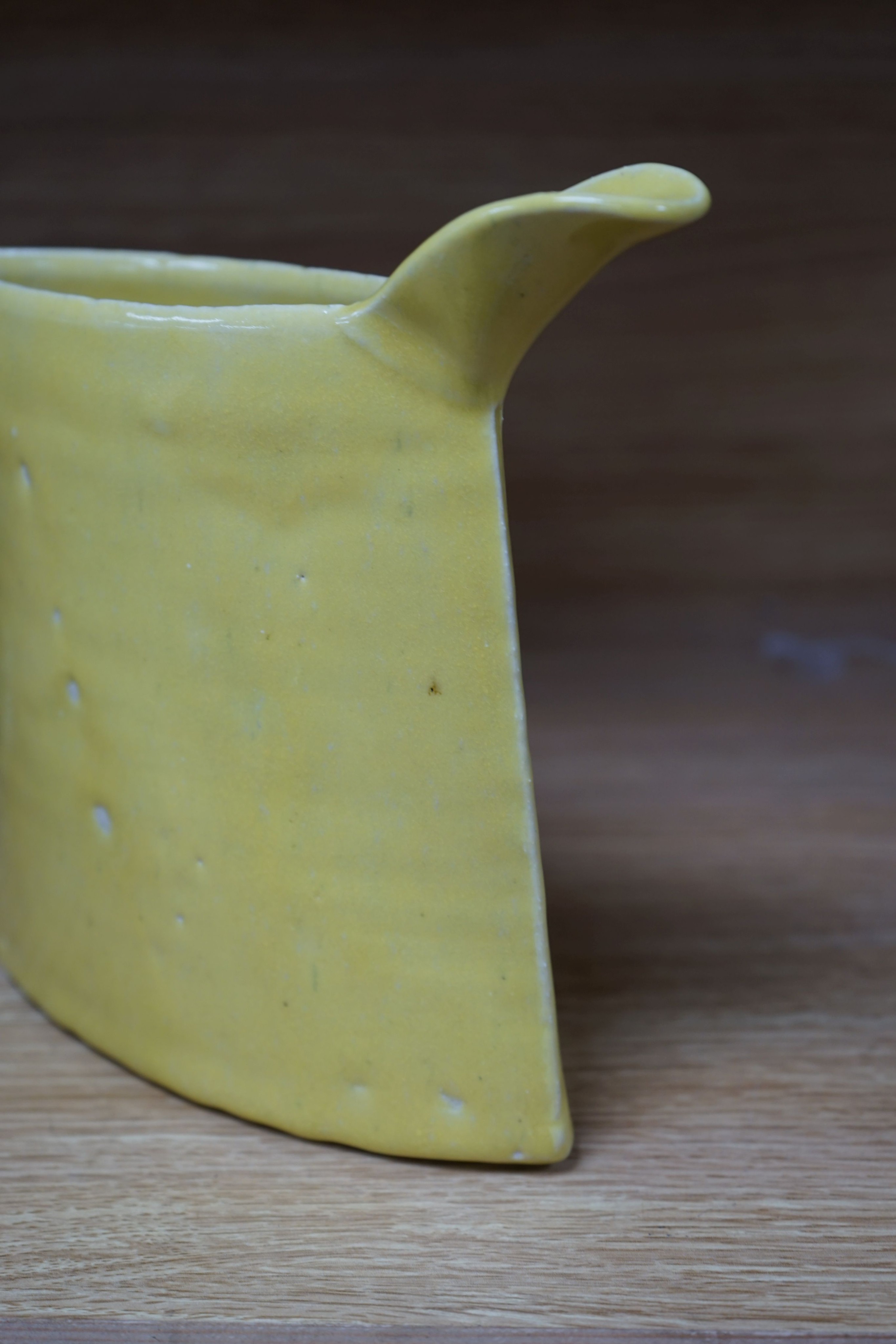 Emmanuel Cooper (1938-2012), a yellow glazed jug 20cm